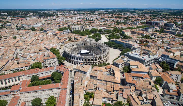 Aerial view of Roman Amphitheater in medieval town Nimes in France