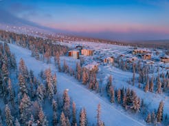 photo of beautiful white winter of frozen lake, mountain at Ylläs Lapland, Finland.