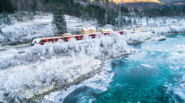 Photo of beautiful winter landscape Train Oslo, Bergen in mountains. Hordaland, Norway.