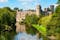 Photo of Warwick castle from outside. It is a medieval castle built in 11th century and a major touristic attraction in UK nowadays.