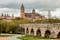 Photo of View on New Cathedral and roman bridge in Salamanca, Spain .