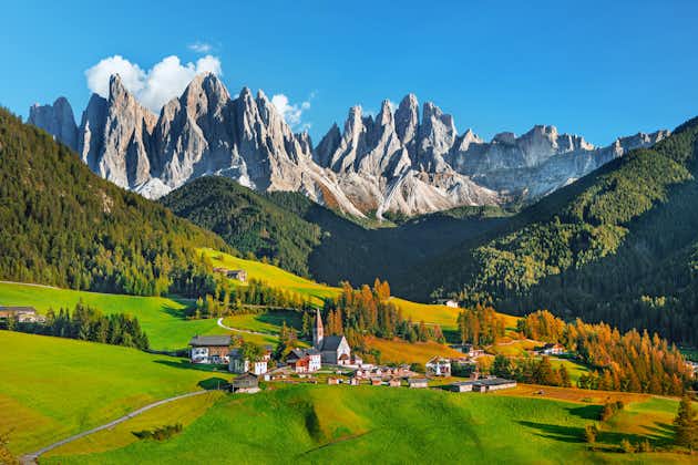 Famous alpine place Santa Maddalena village with magical Dolomites mountains in background, Val di Funes valley, Trentino Alto Adige region, Italy.