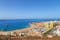 photo of aerial view of the beach and lagoon of Los Cristianos resort on Tenerife, Canary Islands, Spain.