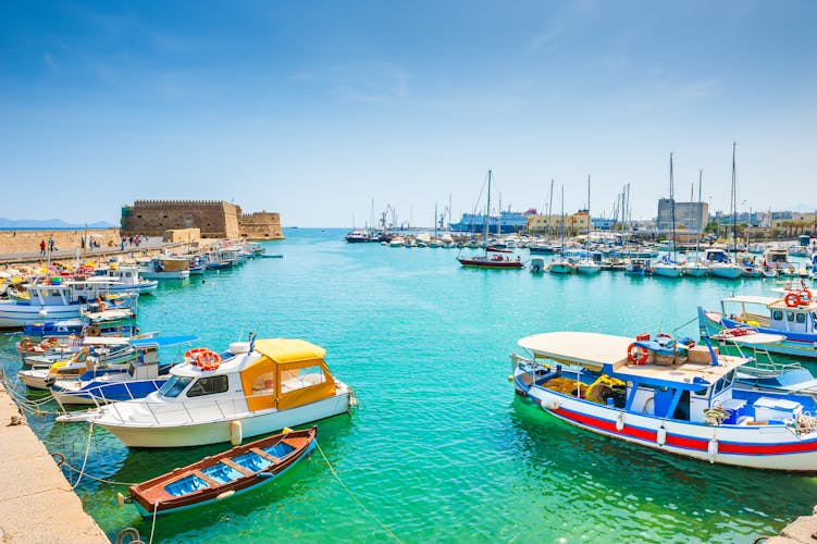 Photo of old venetian harbor with boats in Heraklion, Crete island, Greece.