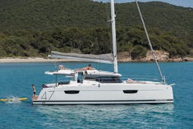 Semi-Private Brand-New Catamaran Cruise in Mykonos with Meal, Drinks & Transport