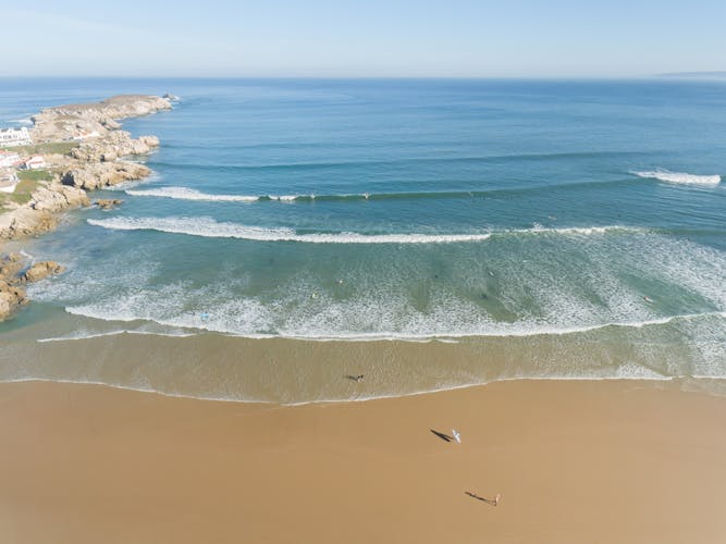 Photo of aerial view of Peniche's sandy beach and Atlantic Ocean in summer.