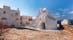 photo of view of The famous Paraportiani Church in Mykonos Town, Cyclades, Greece, on a sunny summer day without people, Mykonos, Greece.