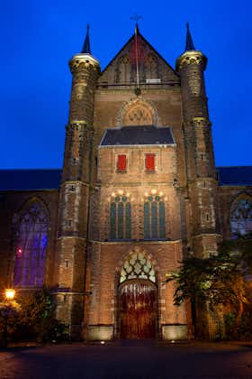 photo of the night image of The Pieterskerk, a late-Gothic church in Leiden dedicated to Saint Peter. It is known today as the church of the Pilgrim Fathers, Leiden, Netherlands.