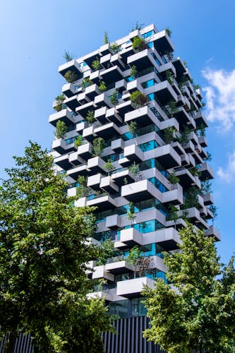 Eindhoven, The Netherlands, June 29th, 2021. Vertical garden tower with trees creating greenery and nature for the social housing residents of the city, Strijp S.