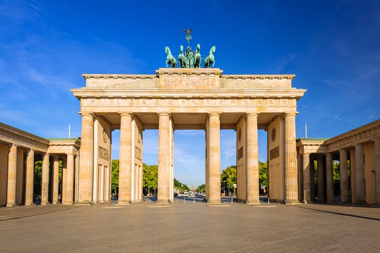 Photo of the Brandenburg Gate in Berlin at sunrise, Germany.