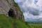 photo of Entrance to the Caves of Kersh, overlooking the green rural landscape of County Sligo, Ireland .