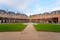 photo of Place des Vosges at morning in the Marais district of Paris, France.