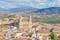 photo of aerial cityscape of Jaen with cathedral and Sierra Magina mountains on background, Andalusia, Spain.