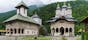 Photo of Lainici Monastery, called "Bride of the gorge" , due of its strong white facade is an orthodox monastery in Targu Jiu ,Gorj County, Romania .