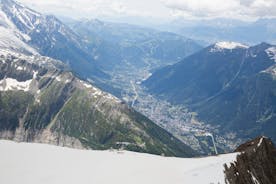 photo of an aerial view from Aiguille des Grands Montets on Argentière in winter, France.