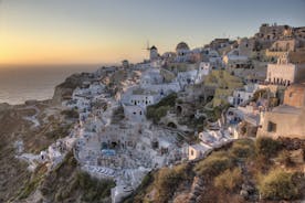 Photo of beautiful White architecture of Oia village on Santorini island, Greece.