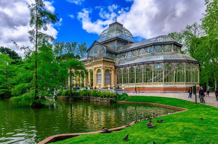 Photo of crystal Palace (Palacio de cristal) in Retiro Park in Madrid, Spain.