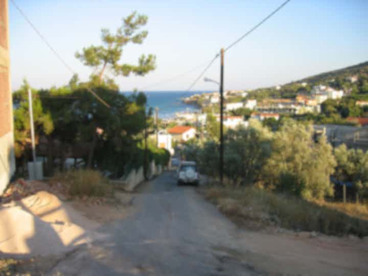 Middelgrote auto's te huur in Karfás, Griekenland