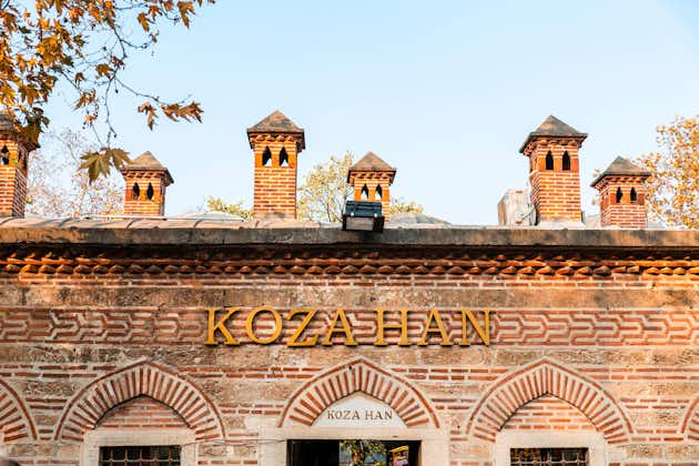 Koza Han tea gardens and mosque in Koza Han Silk Bazaar. Koza Han is historical place from Ottoman times in Bursa, Turkey, and a popular tourist attraction.