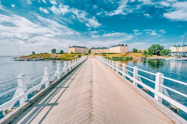 Photo of wooden Bridge Leading To Buildings Of Former Barracks On Territory Of Naval Suomenlinna Fortress Near Helsinki.