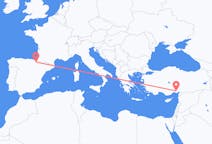 Fly fra Adana til Pamplona
