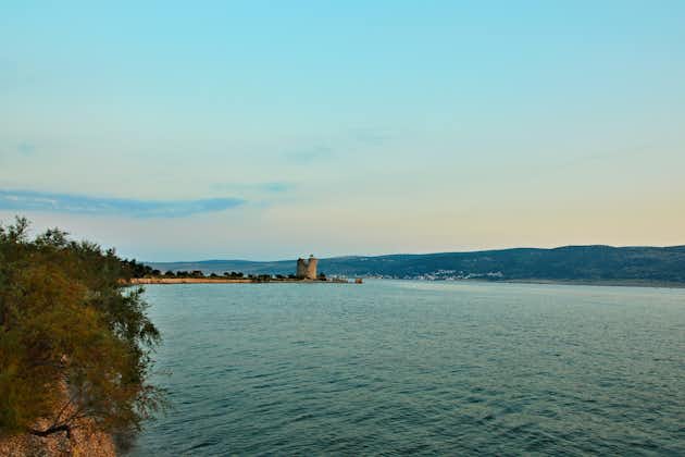 Photo of Večka kula tower and the blue coast, Croatia.