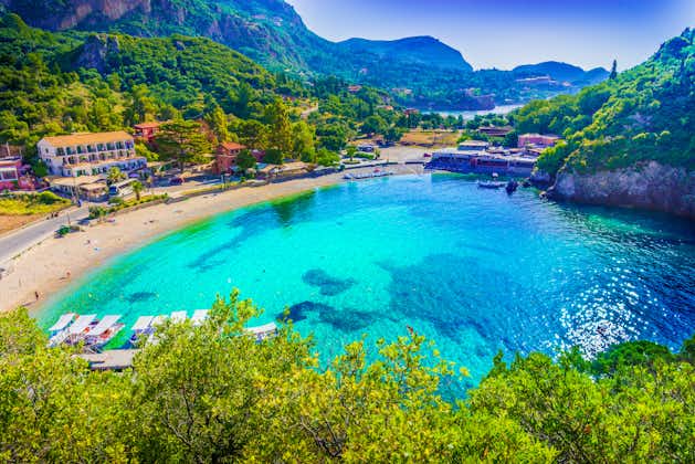 Photo of amazing beach with crystal clear water in Paleokastritsa, Corfu island, Greece.