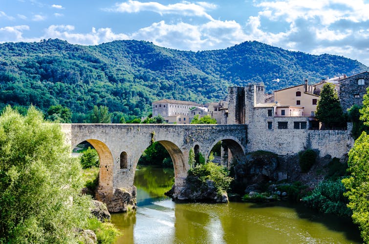 Photo of famous medieval bridge over the river Fluvia in the medieval village de Besalú, Girona, Catalonia, Spain.