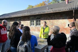 Dachau Concentration Camp Memorial Site Guided Tour with Train from Munich
