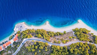 Photo of aerial view of gorgeous azure scene of summer Croatian landscape in Podgora, Dalmatia, Croatia.