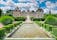photo of the beautiful Château de Cheverny from apprentice's garden in France.