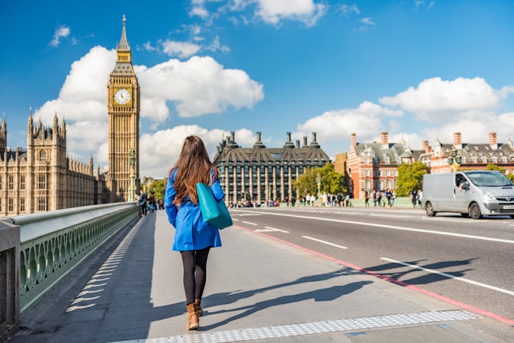 Photo of London city urban lifestyle tourist woman walking.