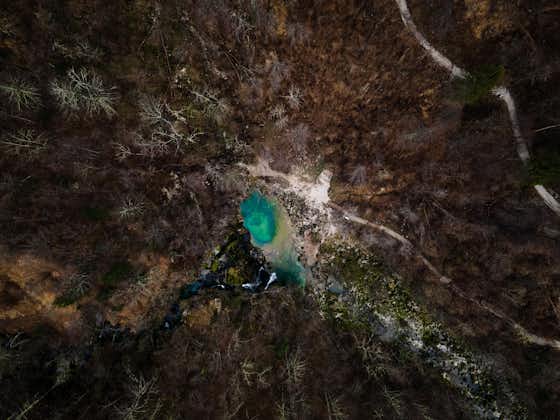 Top down, aerial of a blue eye slap virje waterfall in Slovenia
