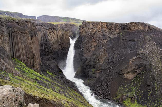 photo of Famous Litlanesfoss waterfall near Hengifoss in Iceland.