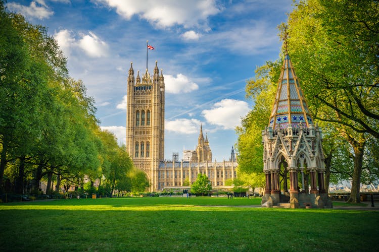Photo of Westminster Abbey viewed from Victoria tower gardens, London, UK.