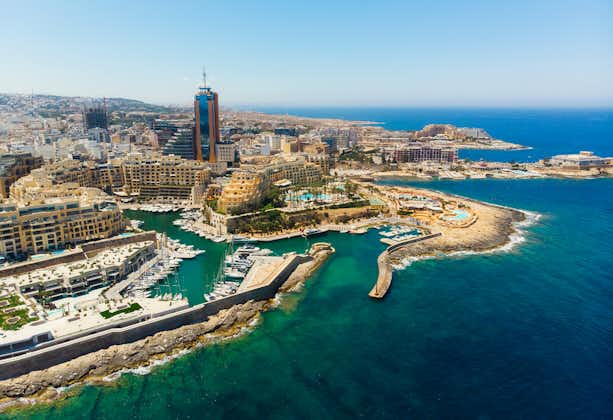 Aerial view of St. Julian's city and Portomaso tower. Malta country, Summer
