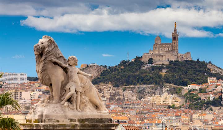 Notre Dame de la Garde Cathedral and Statue Of Child And Lion in Marseille, France