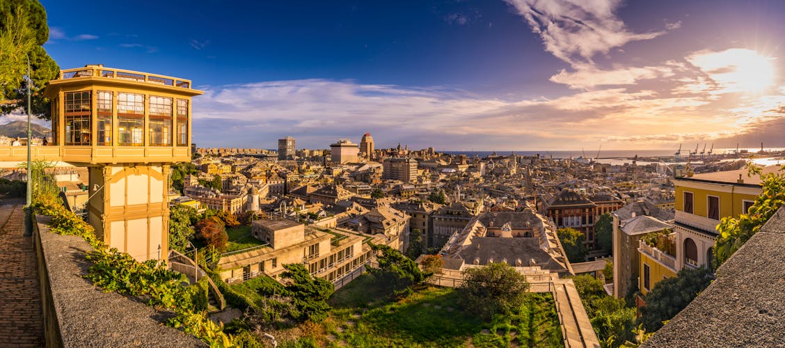 Photo of View of Genoa at sunset from "Spianata Castelletto", Italy.