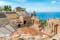 photo of Ruins of the Ancient Greek Theater in Taormina on a sunny summer day with the mediterranean sea. Province of Messina, Sicily, southern Italy.