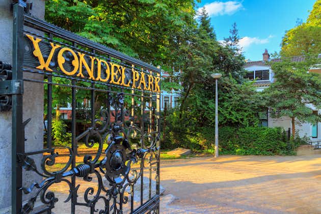 Photo of golden letters on the gate at the entrance to the Vondelpark in Amsterdam, the Netherlands, on a beautiful spring morning.