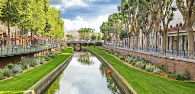 Photo of the Canal and Castle of Perpignan in springtime, Pyrenees-Orientales, France.