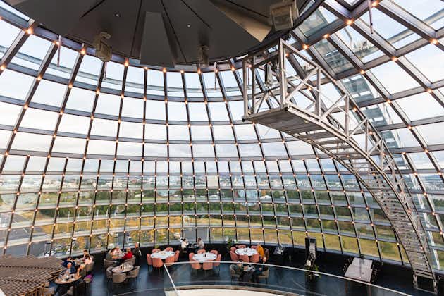 photo of people in cafe inside glass dome on observation deck of perlan museum in Reykjavik city in evening. The perlan museum of wonders of Iceland was opened in 2017 Iceland.