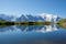photo of Mont Blanc reflected in Cheserys Lake in winter, Mont Blanc Massif, Alps, France.