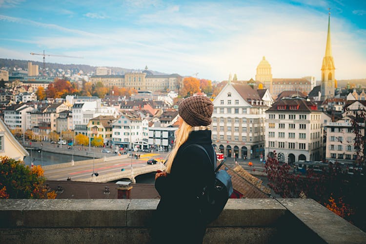 Photo of  tourist girl enjoying her travel in Zurich, Switzerland.