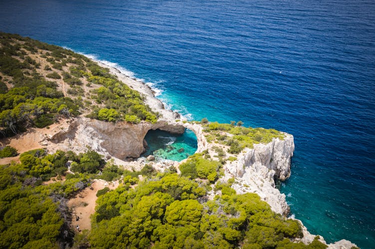 Photo of aerial view of seals cave and beautiful beach in Loutraki ,Greece.