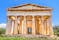 Photo of Temple of Hephaestus in Ancient Agora, Athens, Greece. Sunny front view of classical Greek temple.