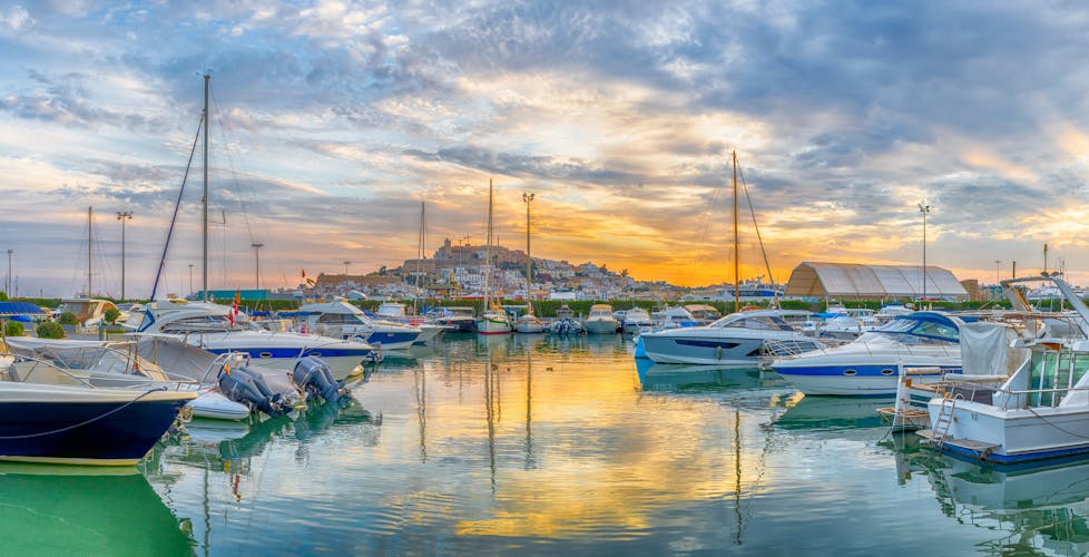 Photo of landscape with Eivissa harbour at sunset time, Ibiza island, Spain.