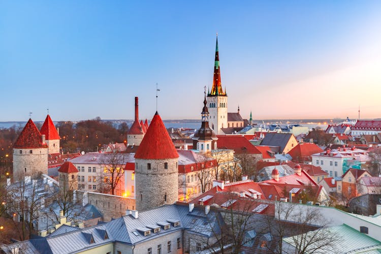Photo of aerial cityscape with Medieval Old Town, St. Olaf Baptist Church and Tallinn City.