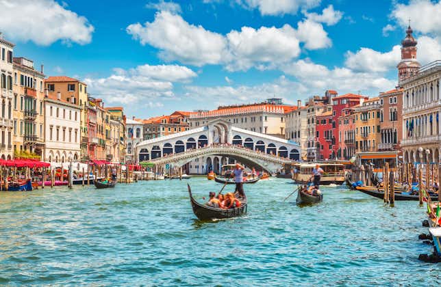 Bridge Rialto on Grand canal famous landmark panoramic view Venice Italy.