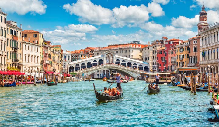 Bridge Rialto on Grand canal famous landmark panoramic view Venice Italy.